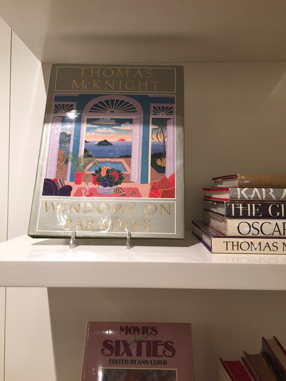 Thomas McKnight's Windows On Paradise book featured in the window of Barneys New York City